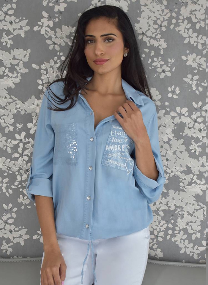 Frank Lyman, Niebieska bluzka koszulowa.