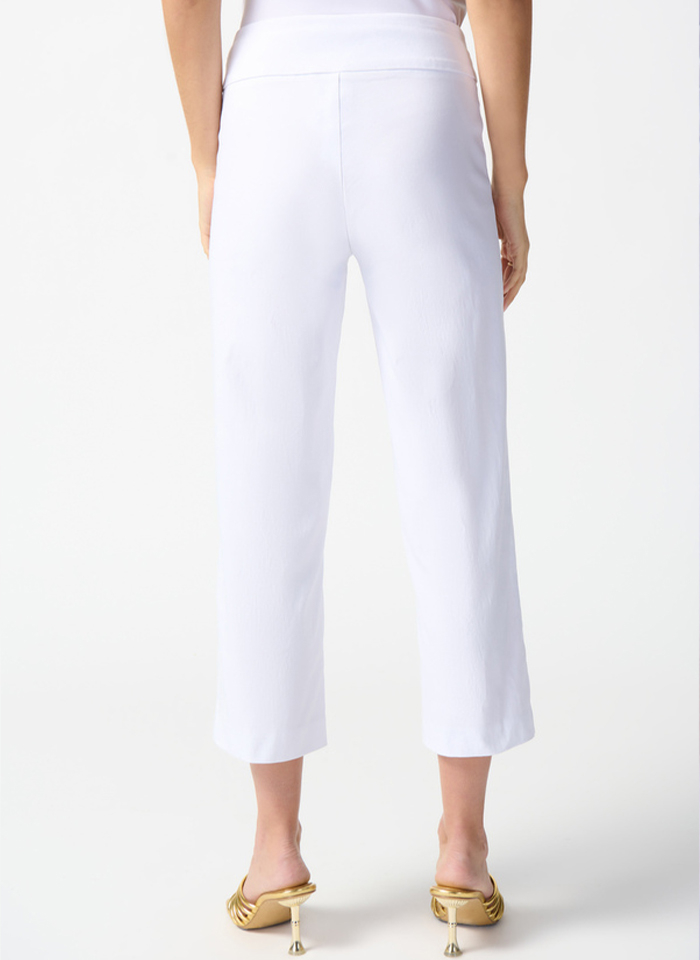 Joseph Ribkoff. Białe spodnie z pękniętą nogawką.